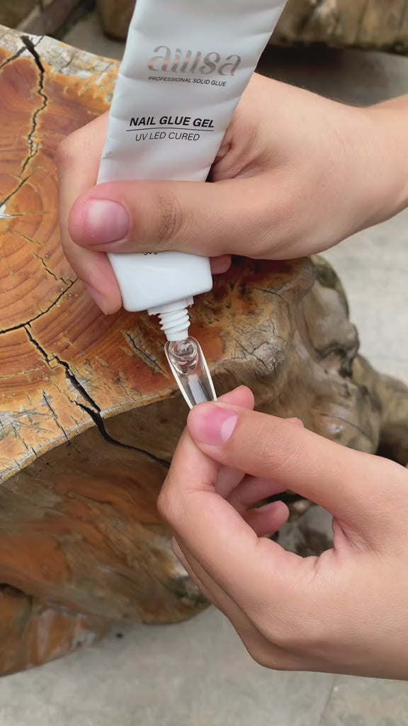 AILLSA Solid Gel Nail Glue for Nail Tips Super Strong Gel Glues Professional Fake Acrylic Soft Nails Glue U V Lamp Curing Needed - Long Lasting 15g / 0.5fl.oz